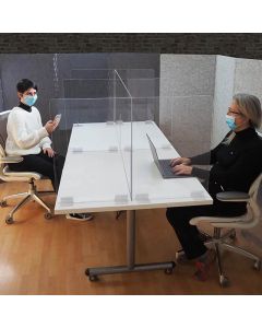 Clear Polycarbonate Table Divider on a White Table Creating Physical Separation